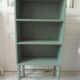 Small vintage bookcase enhanced in smoky green