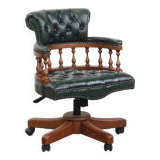 Dark green chesterfield office chair in cowhide leather on wheels