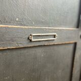 Old wooden locker with black patina