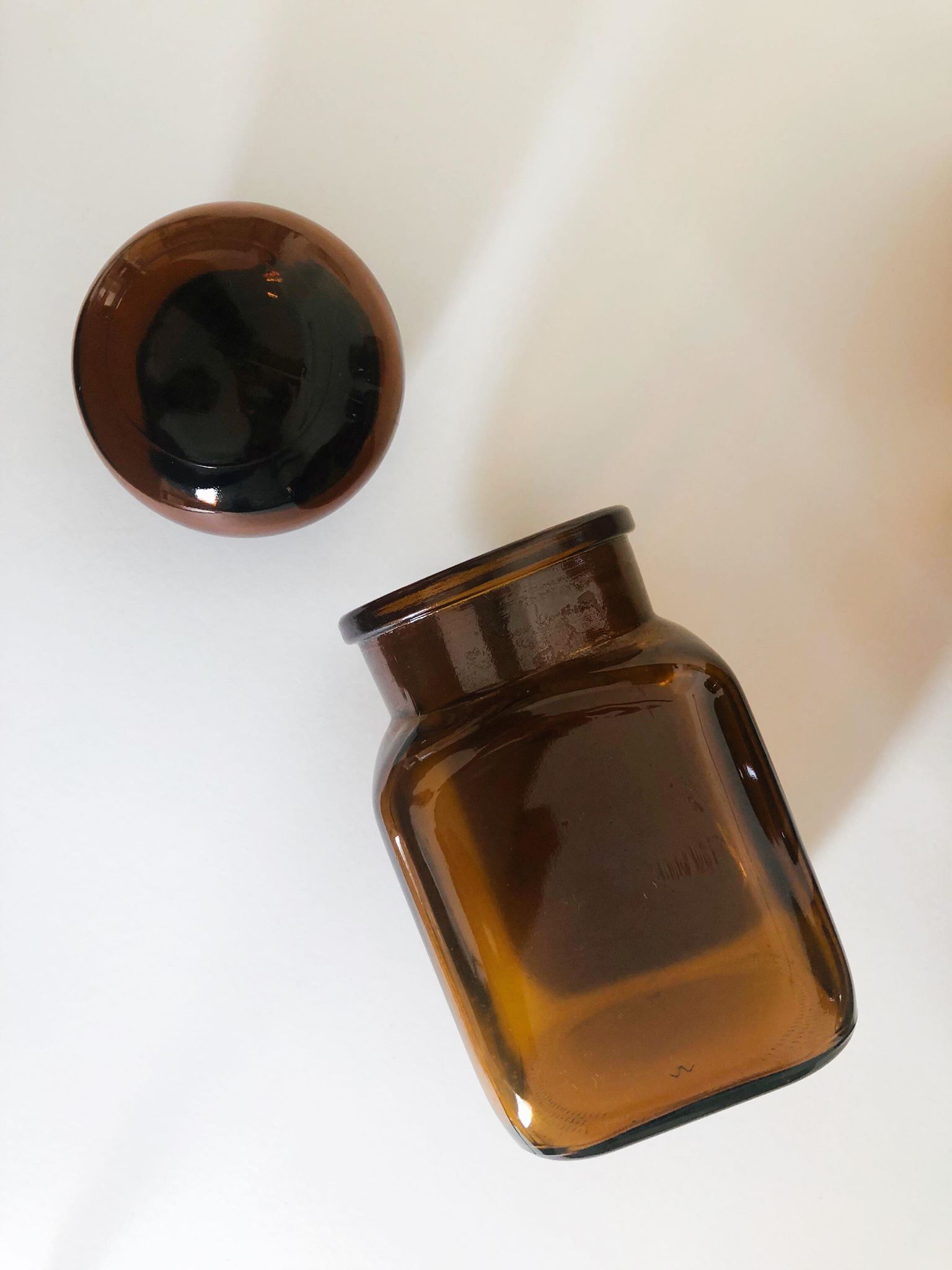 Lot of 4 bottles of amber glass apothecary style