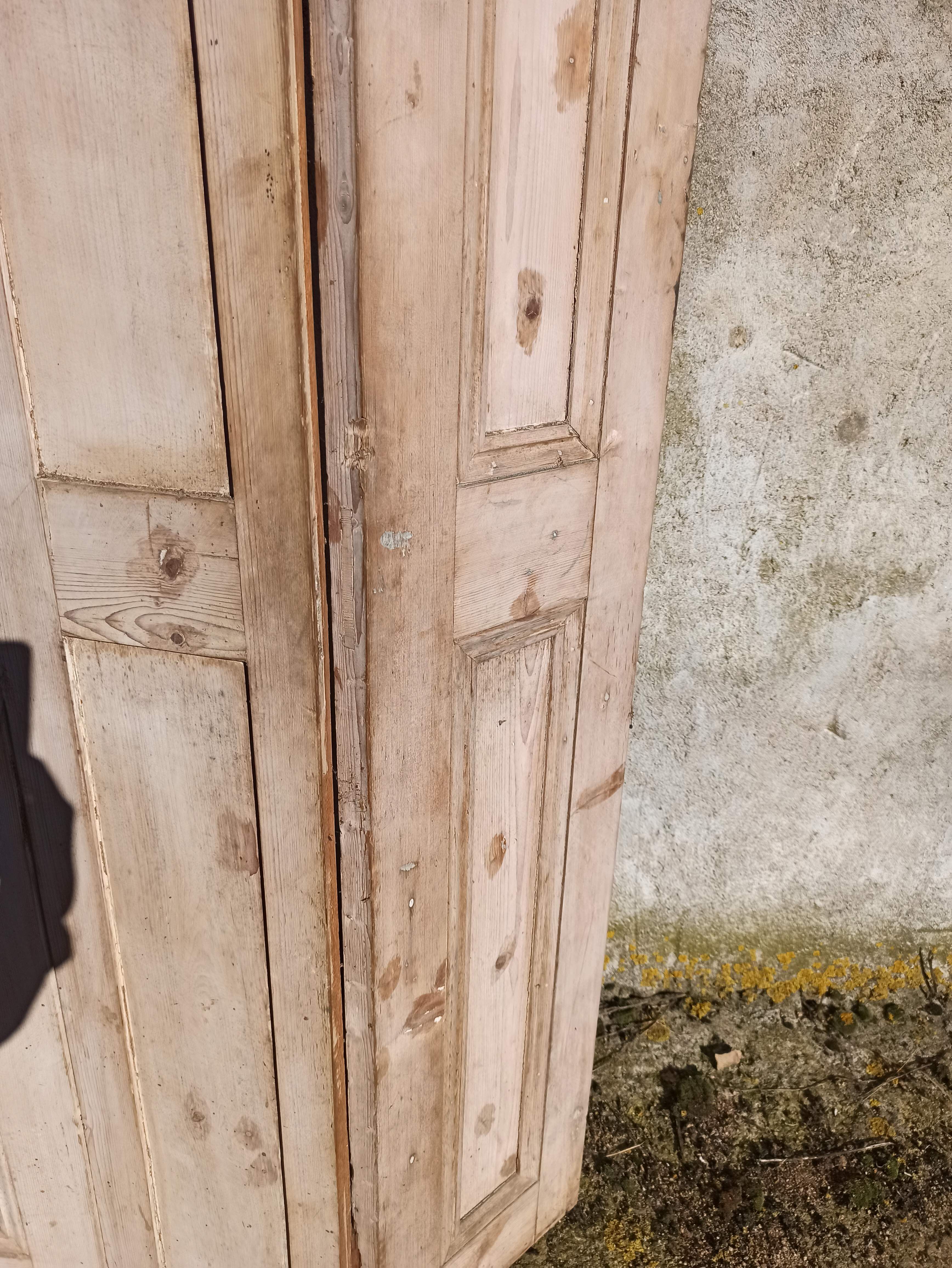 Old trio of wooden screen doors