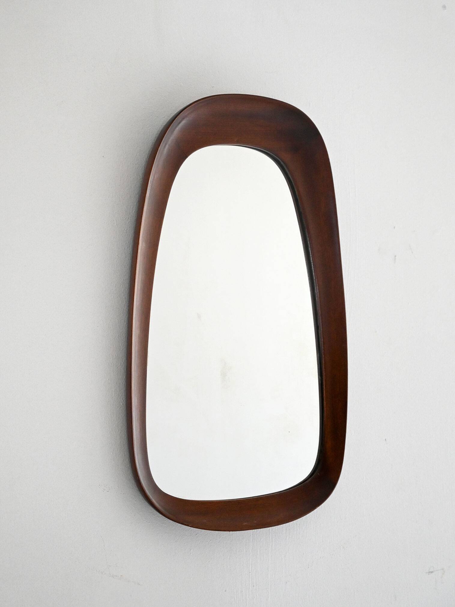 Scandinavian vintage mirror with curved mahogany frame