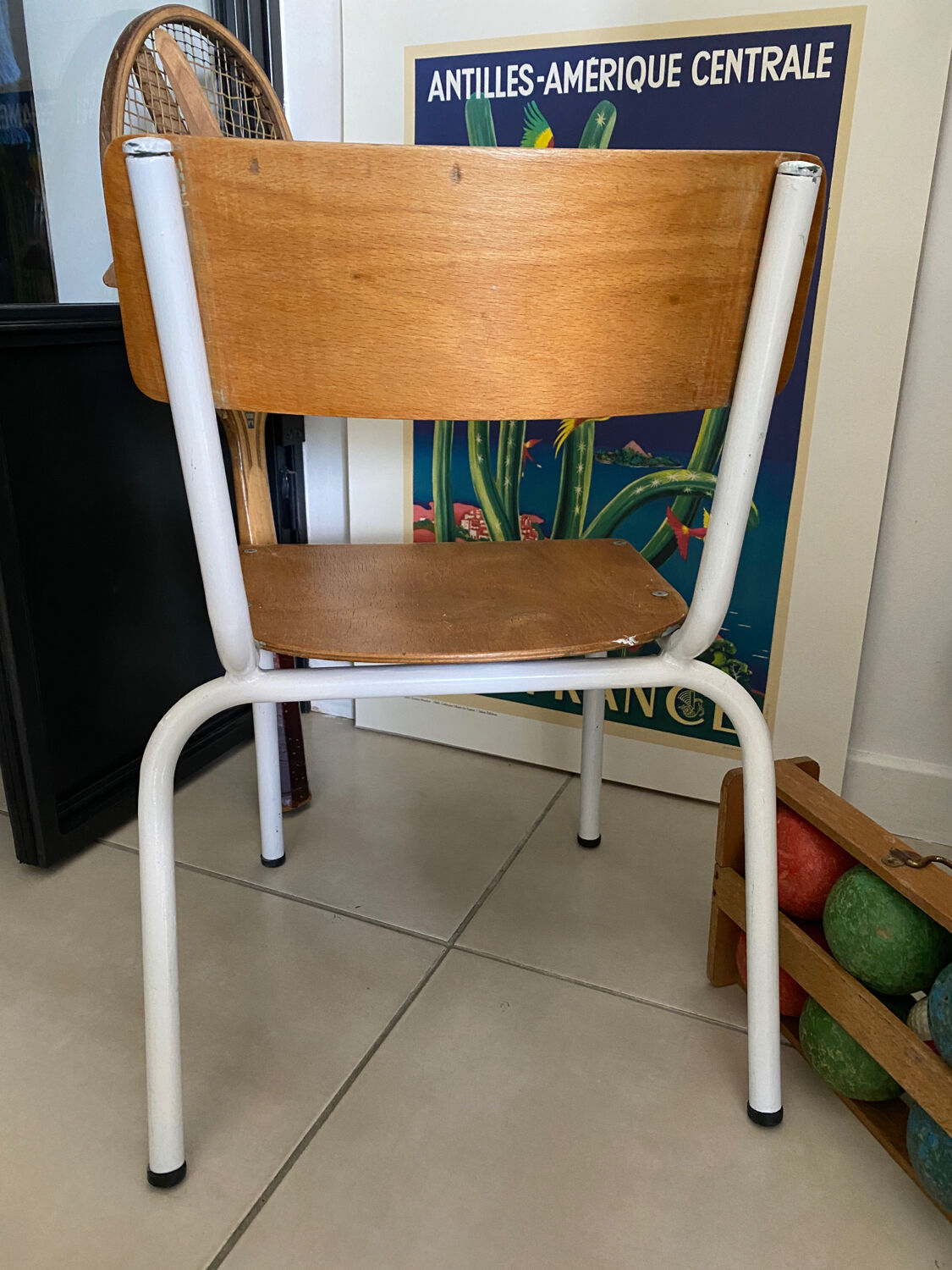 Old wooden and metal children's school chair