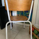 Old wooden and metal children's school chair