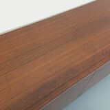 Vintage modernist enfilade in rosewood and chrome metal from the 60s and 70s.