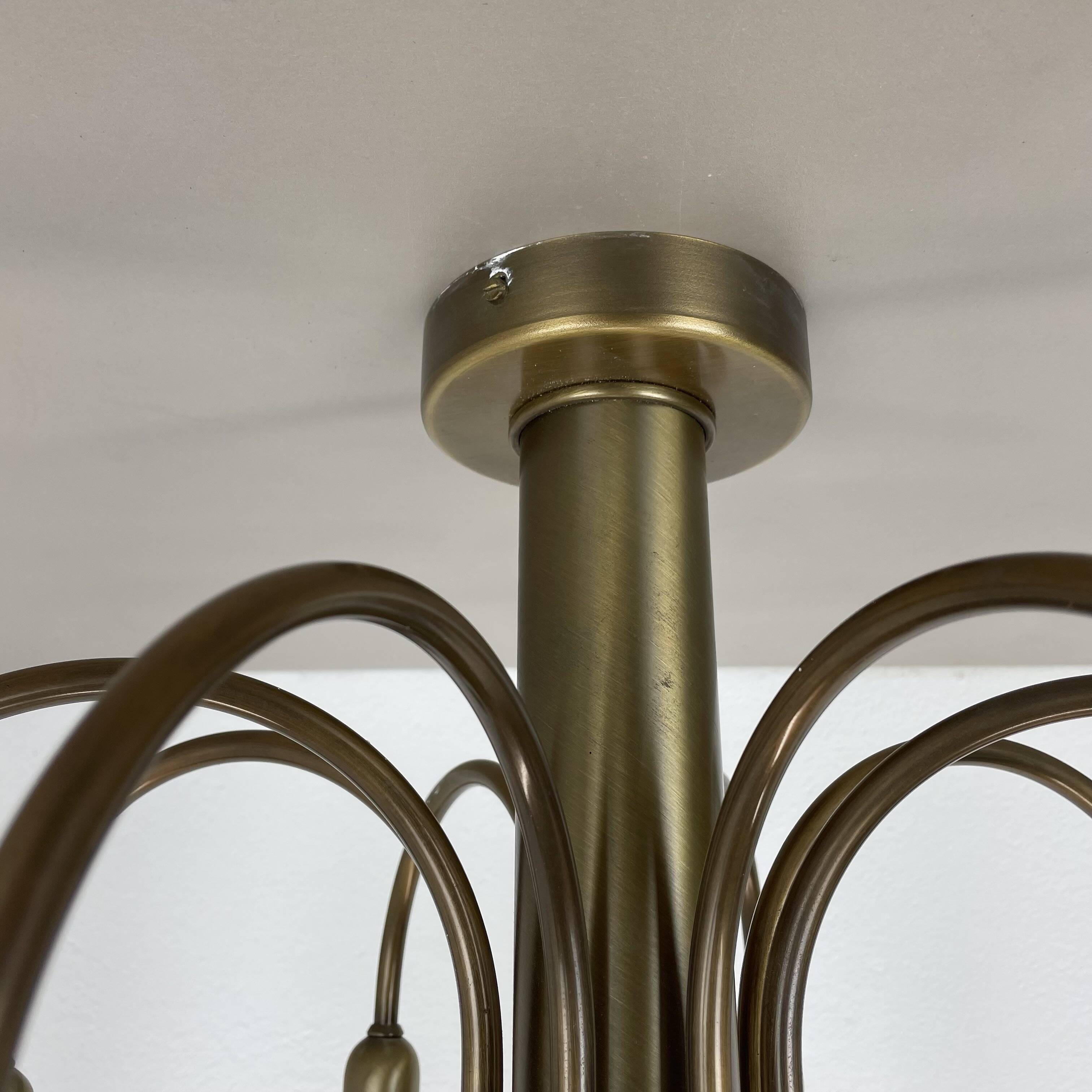 large 12-armed solid Brass ceiling light Chandelier by WKR Lights, Germany 1970s