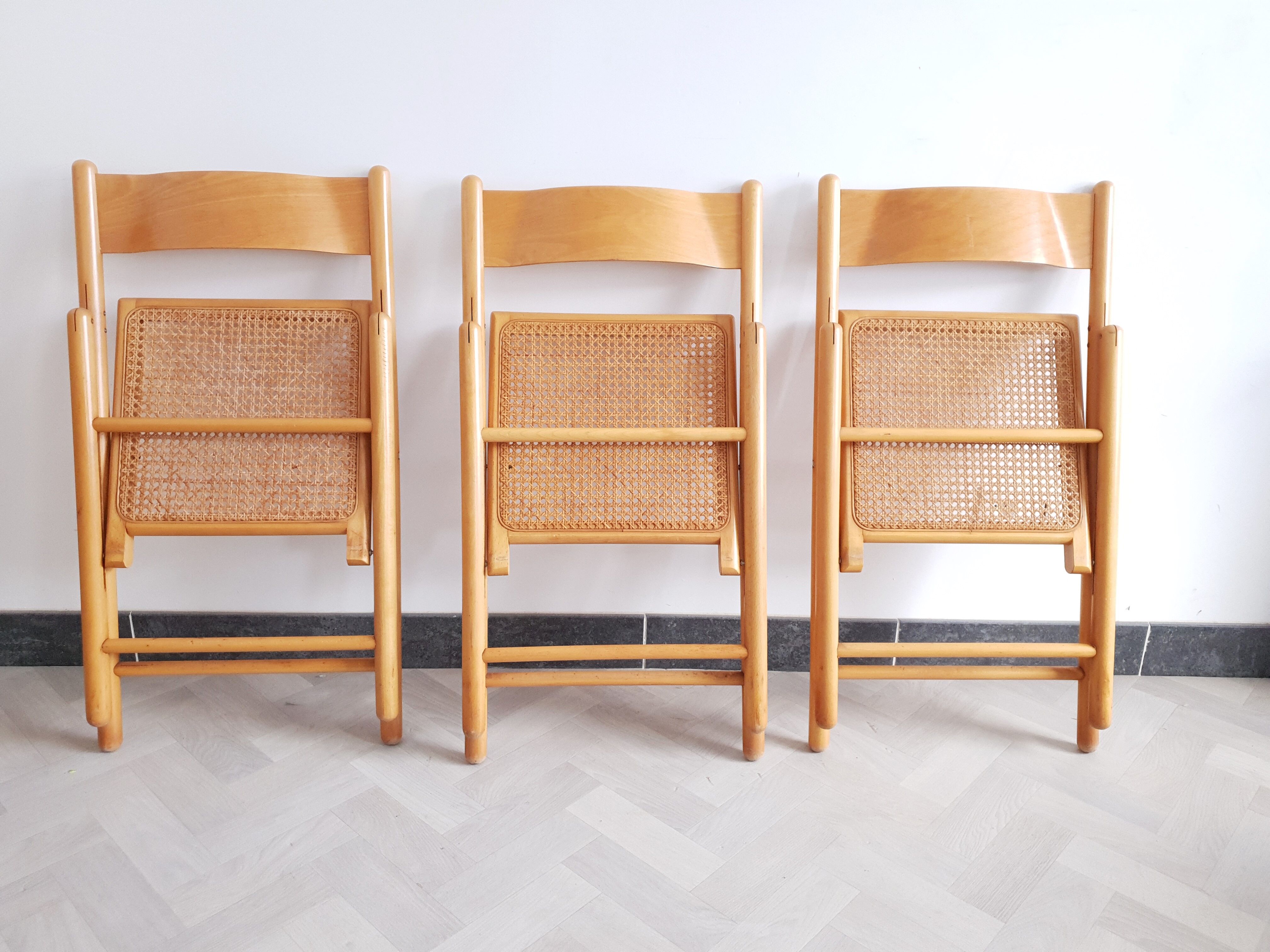 Trio of cannate chairs