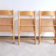 Trio of cannate chairs