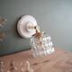 Small chiselled glass wall light