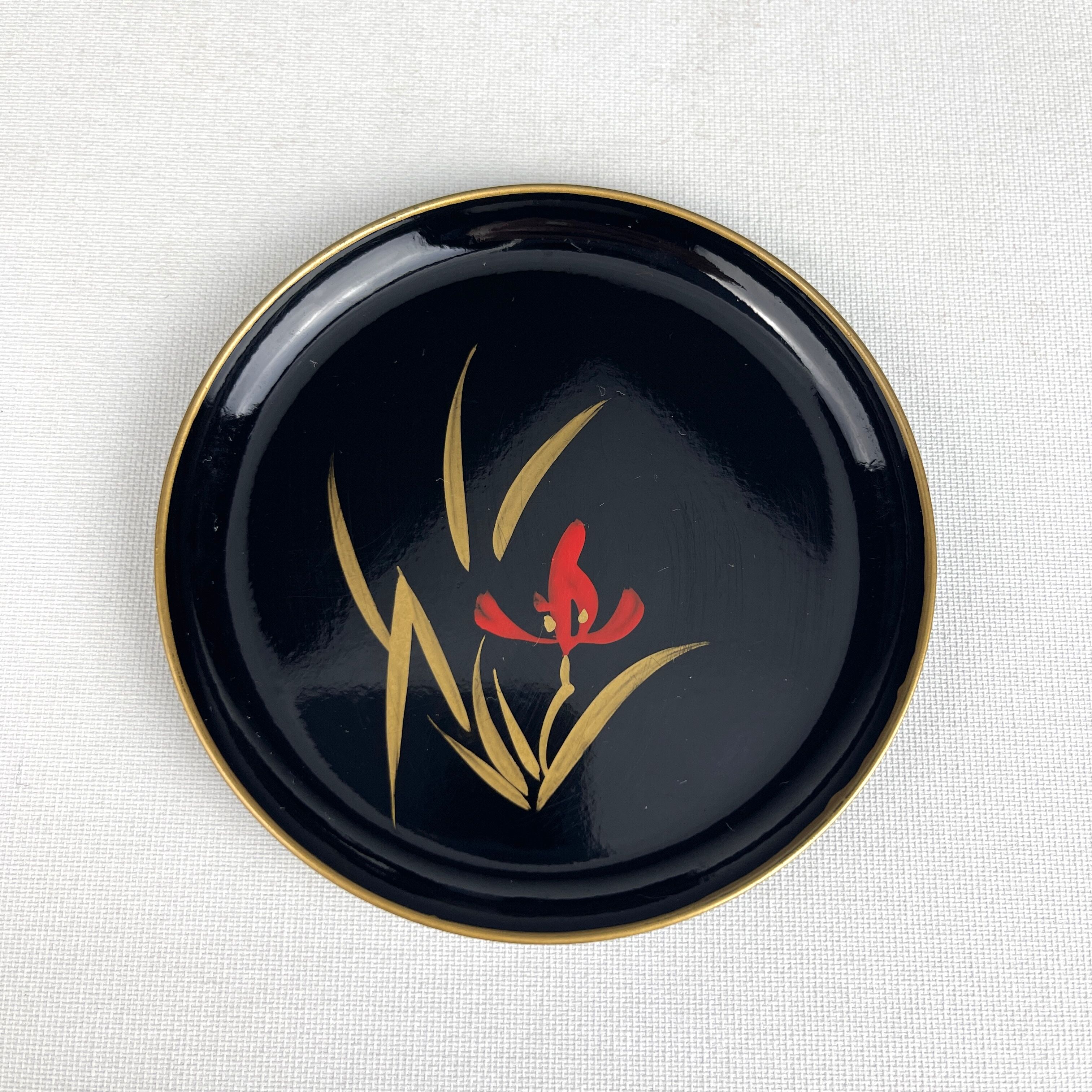 Coasters and their vintage black lacquered wooden box
