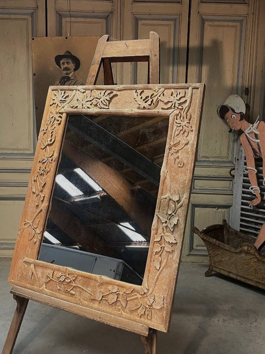 Art Nouveau mirror decorated with poppy leaves, signed by Roger père.