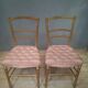 Paire de chaise capitonnée en bois doré