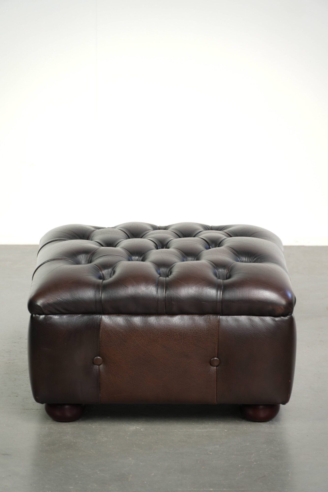 Cowhide Chesterfield ottoman with beautiful colours in English style