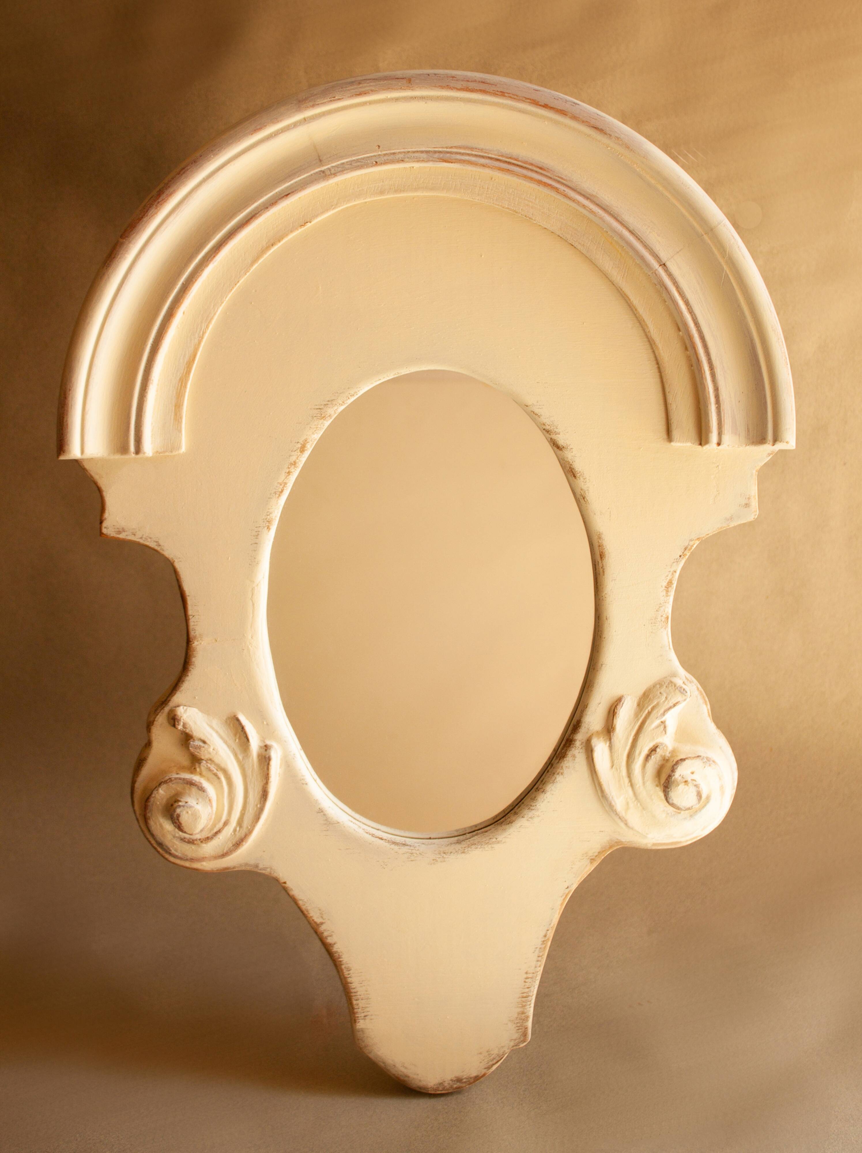 Vintage carved wooden mirror.