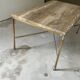 Table basse travertin et laiton