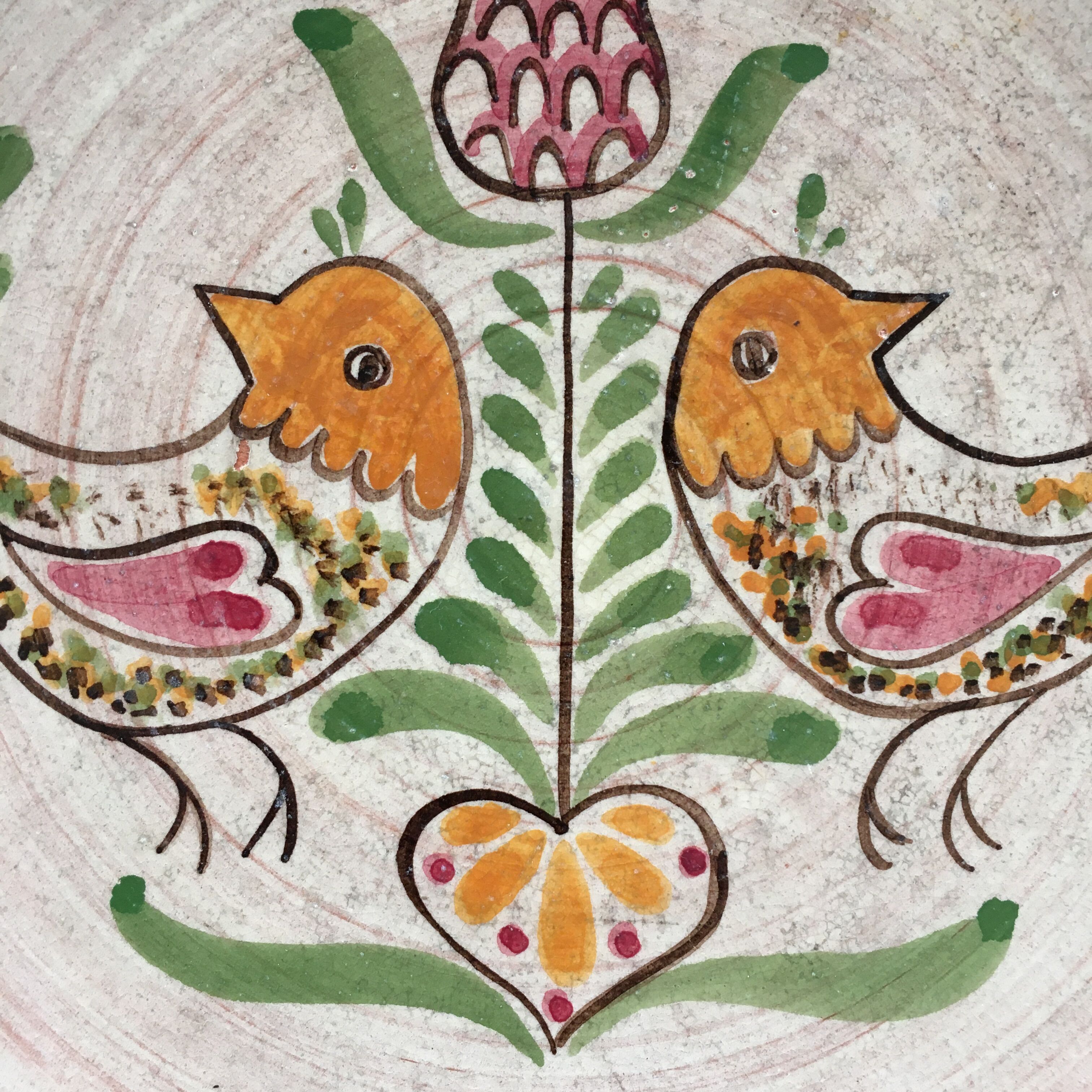 Decorative plate with birds, signed.