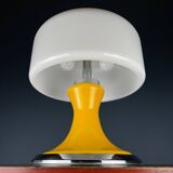 Mid-century Italian yellow table lamp from the 1970s.