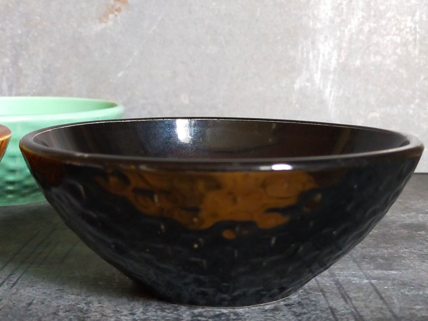 Seven vintage slip ceramic bowls