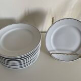12 white porcelain plates with silver edging