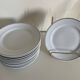 12 white porcelain plates with silver edging