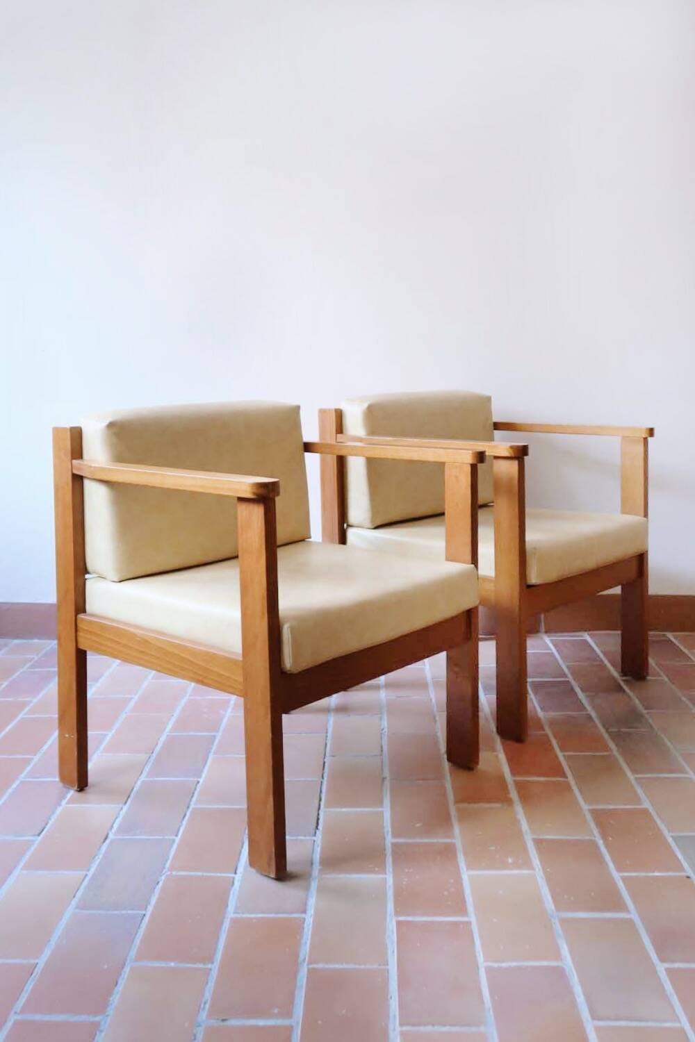 Pair of yellow armchairs