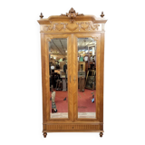 Armoire a miroirs style louis XVI en noyer a patine blonde vers 1880