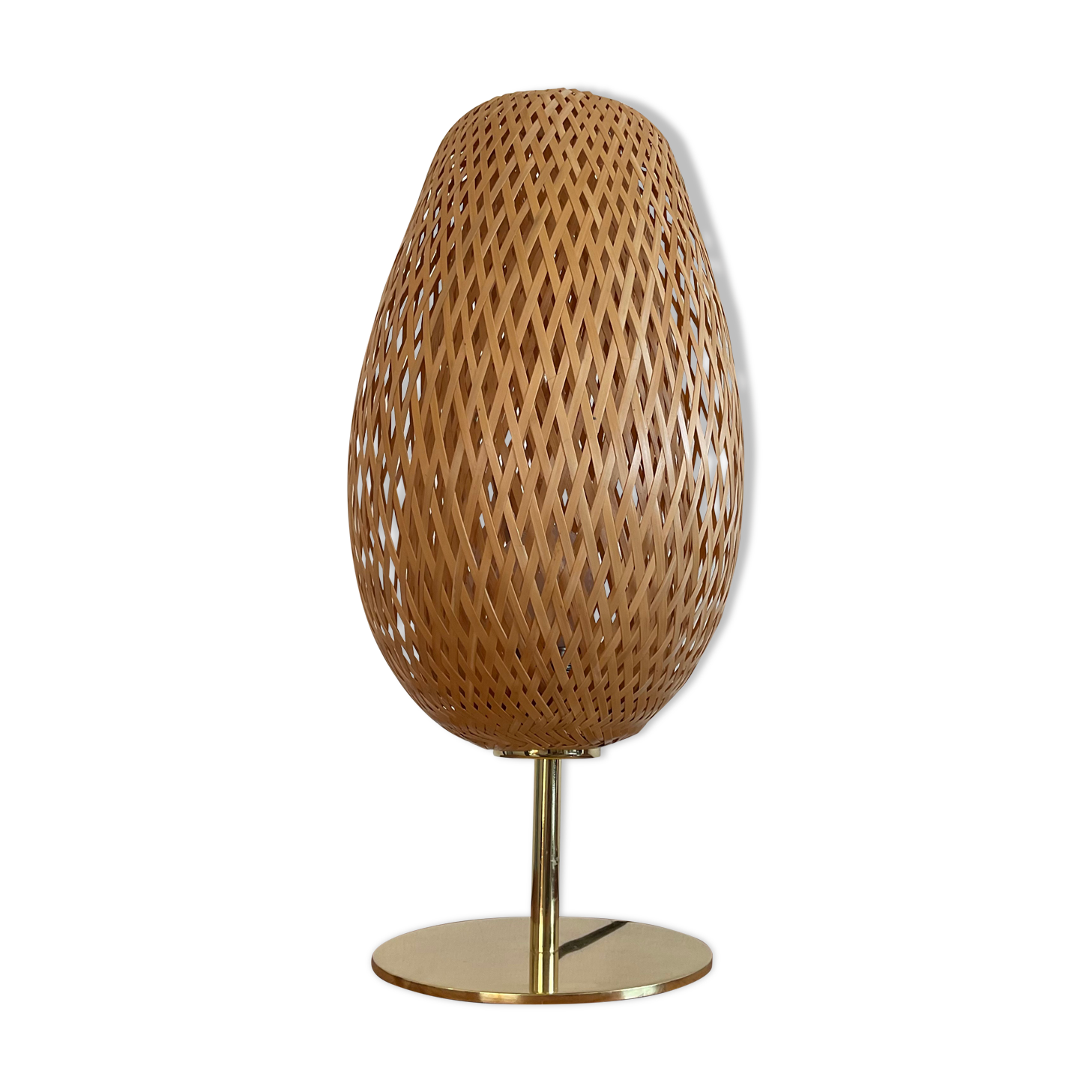 Design lamp in gold metal and wicker