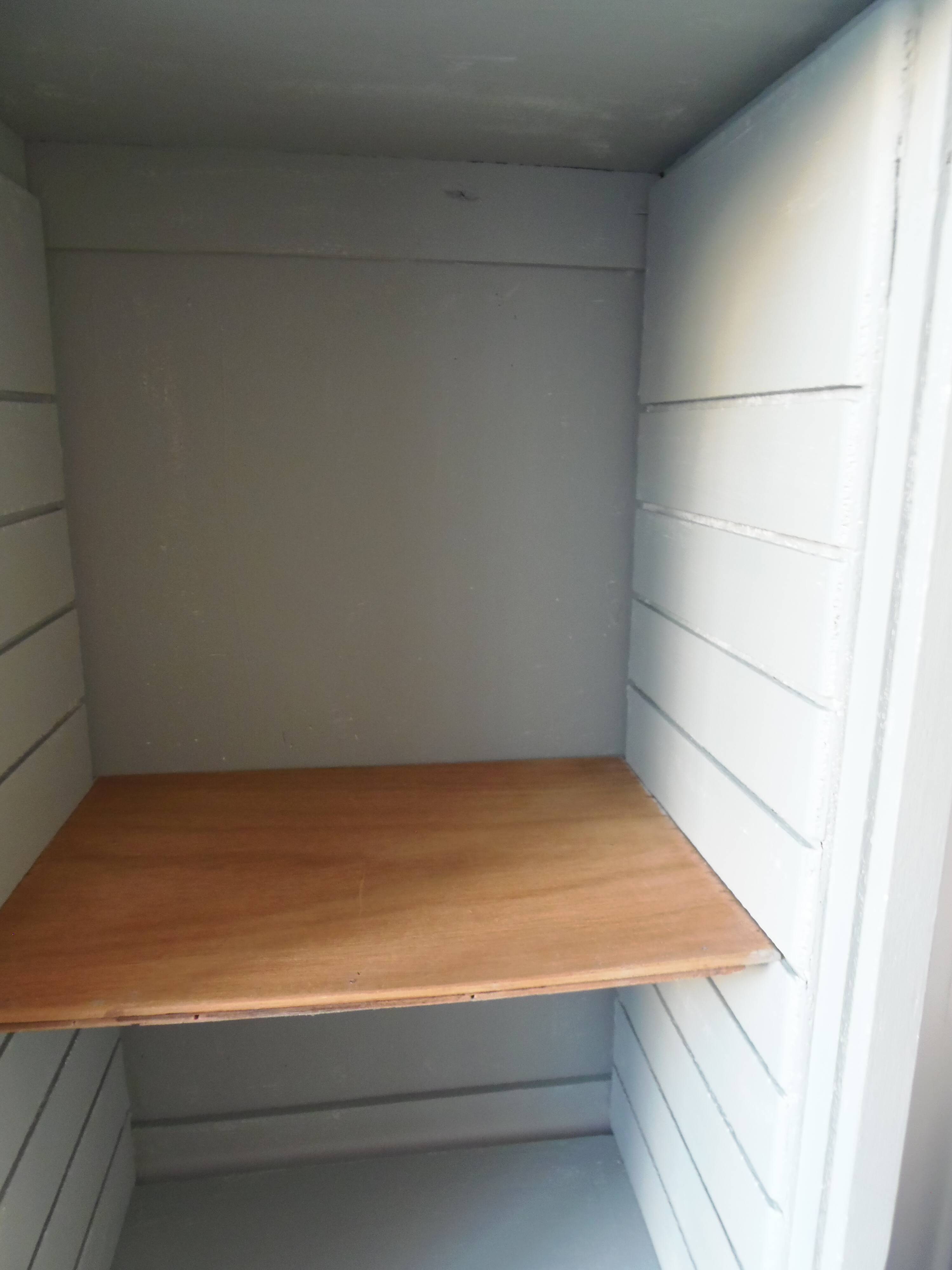 Vintage furniture transformed into a bookcase, verdigris patinated sideboard.