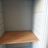 Vintage furniture transformed into a bookcase, verdigris patinated sideboard.