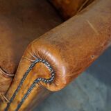Vintage club armchair in leather color cognac Netherlands