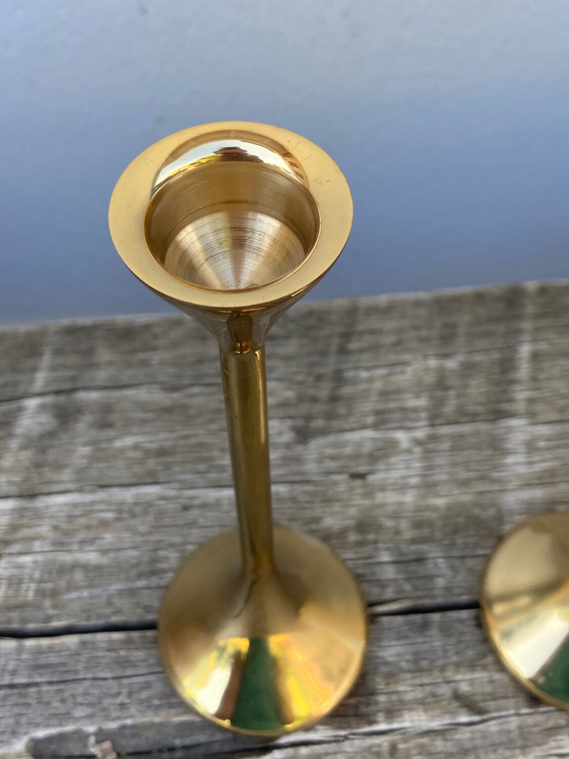 Duo of Scandinavian candle holders in gilded brass
