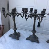 4 identical old brass candlesticks