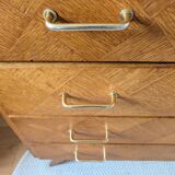 Vintage chest of drawers with checkerboard and compass feet