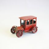 Vintage tin car with pull lever