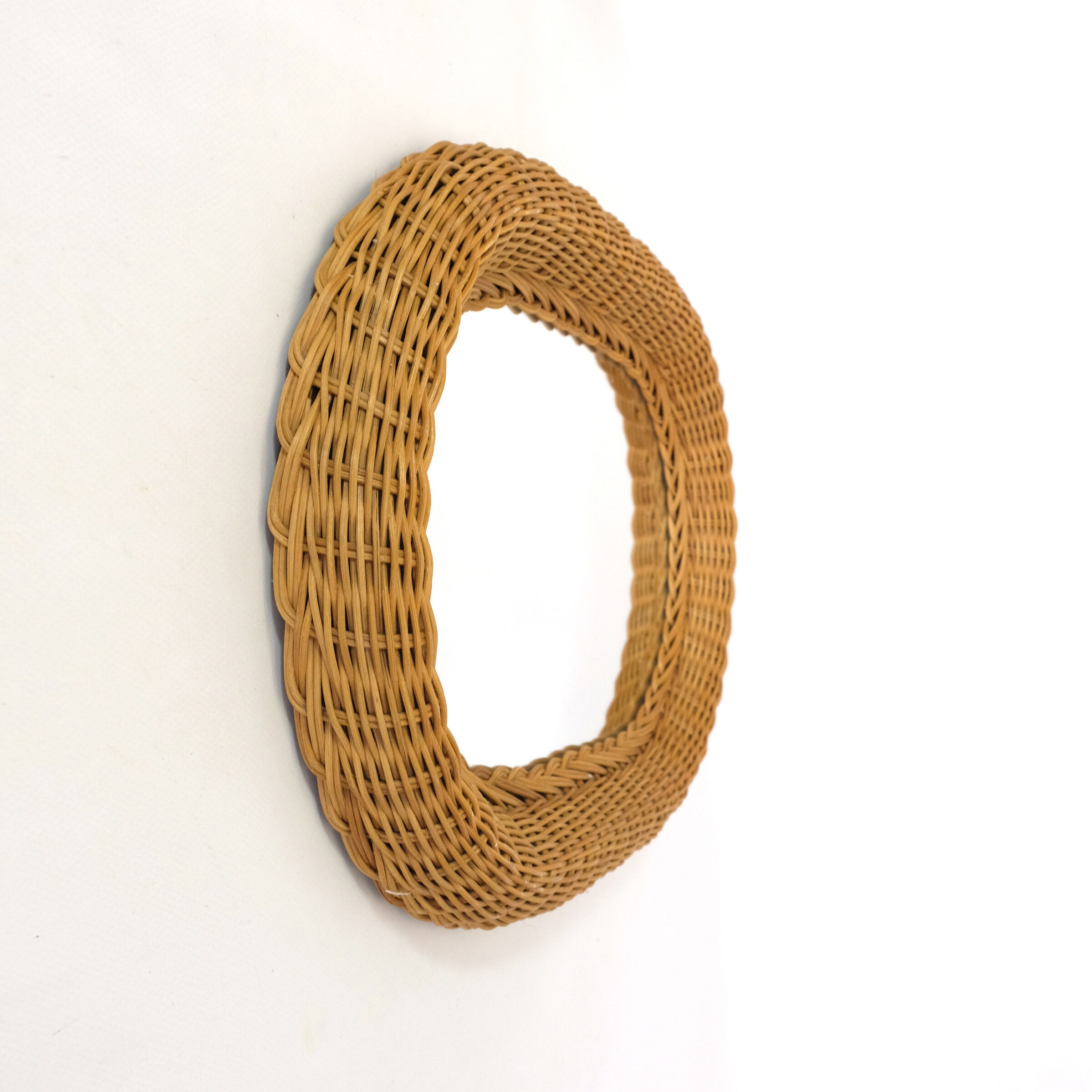 Mirror with thick wicker frame, 54x38 cm.