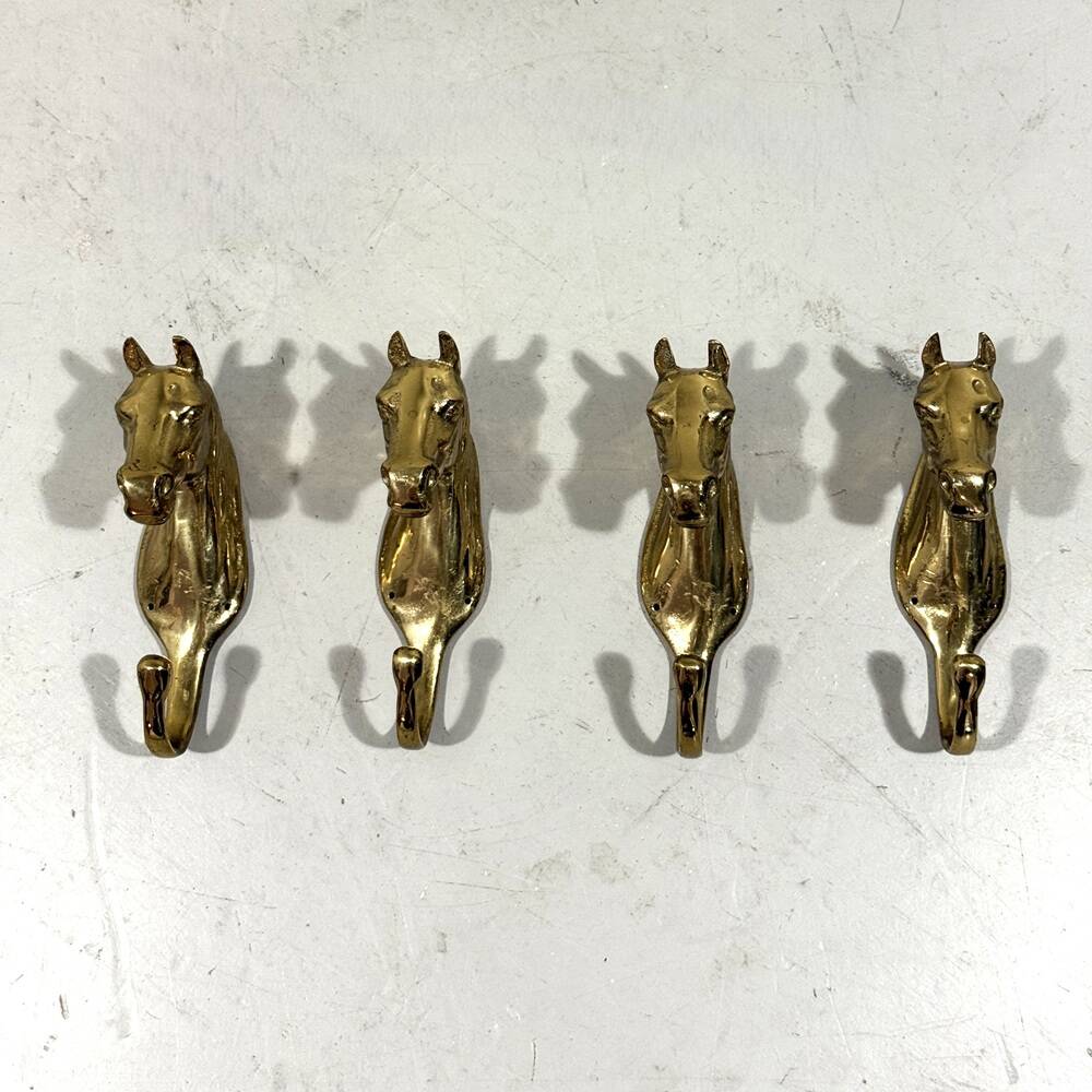 Brass horses coat hooks 1960’s, set of 4