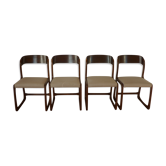 Suite de 4 chaises traineau Baumann