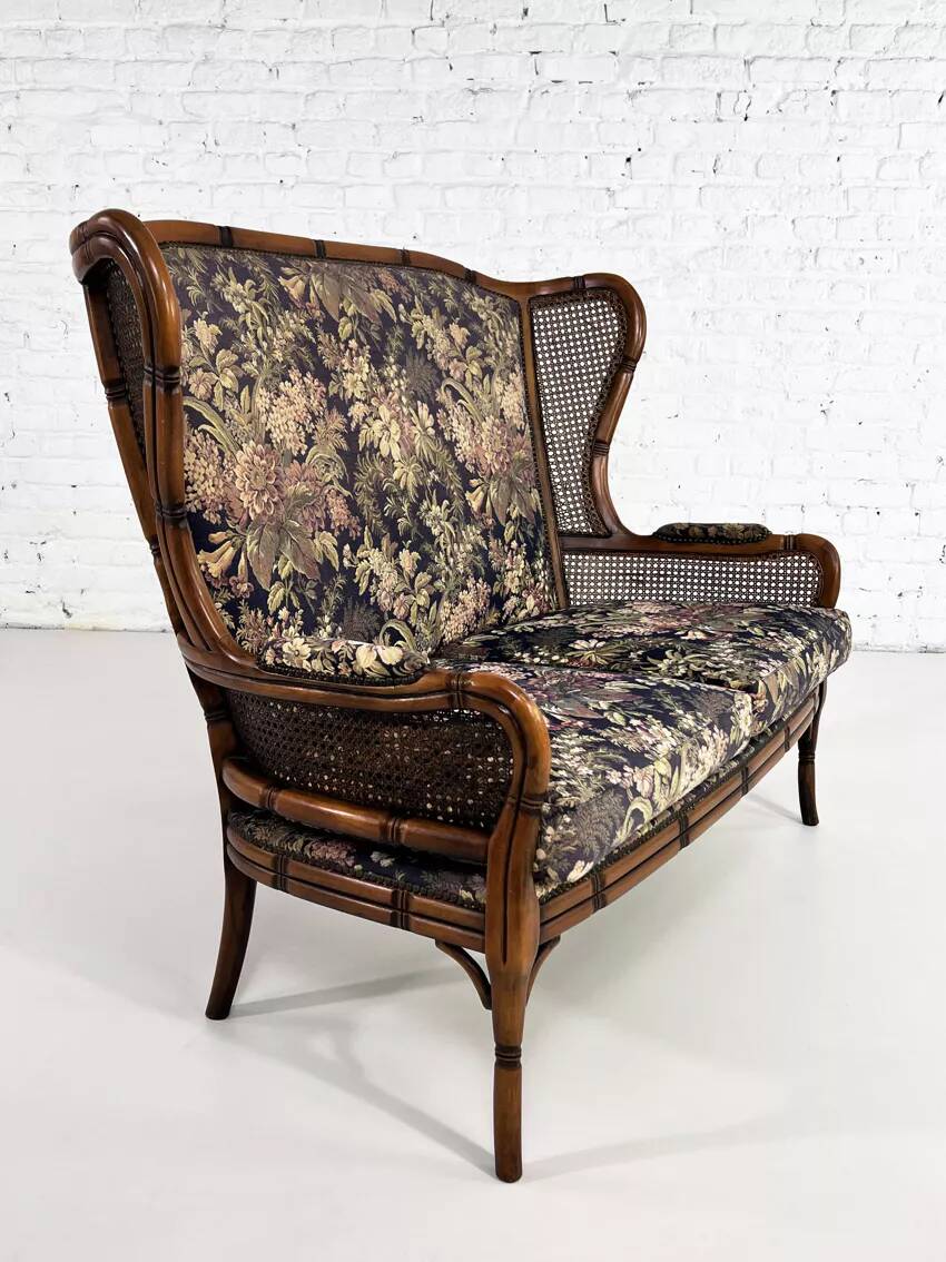 Wingback 2-seater sofa in carved wood, cane and fabric
