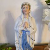 Religious statuette of the Virgin Mary in bisque porcelain