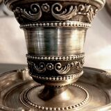 Chiseled silver metal candle holder
