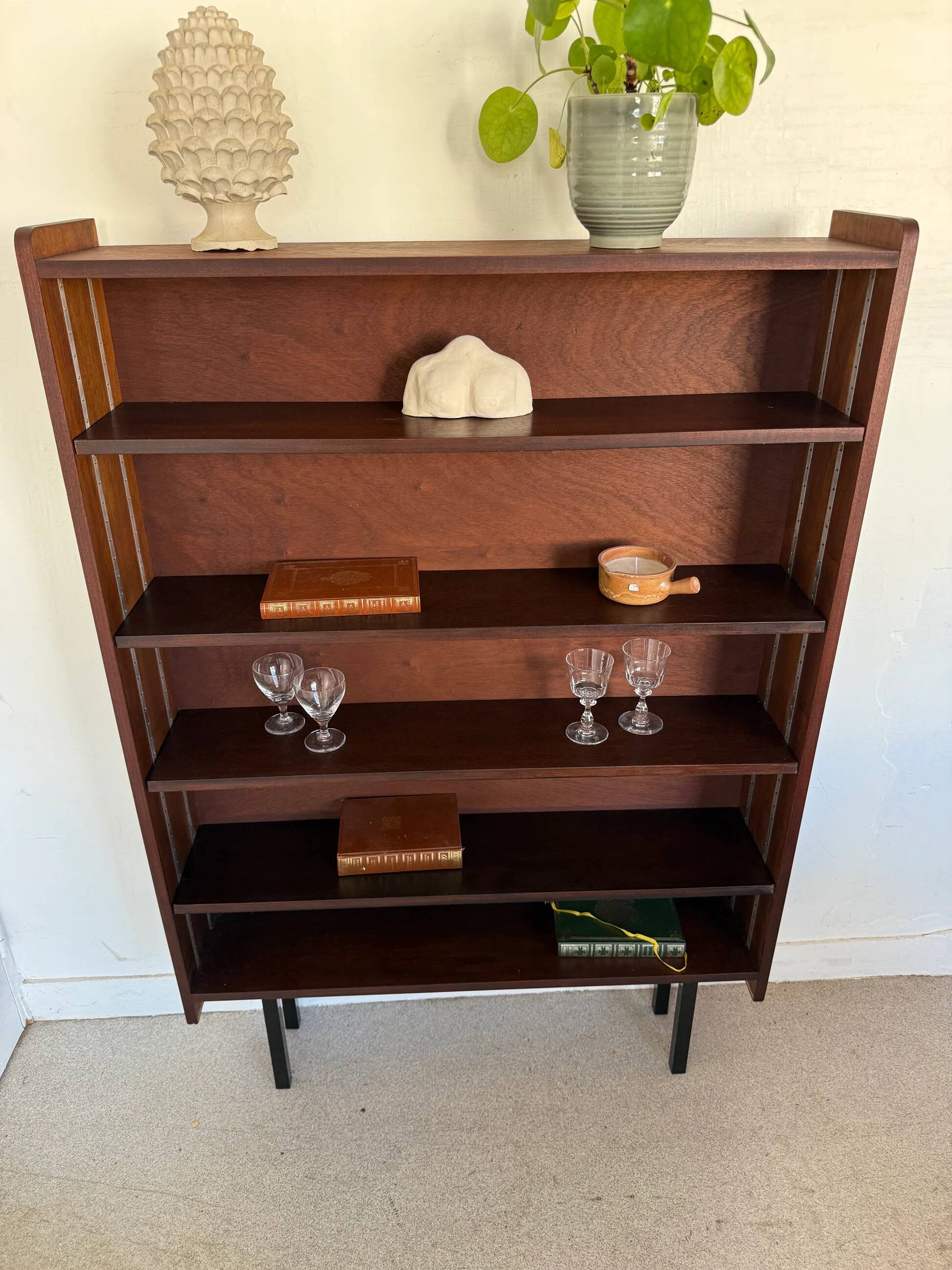 Vintage veneer bookcase with metal legs