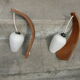 Pair of vintage Philips wood and opaline wall lamps