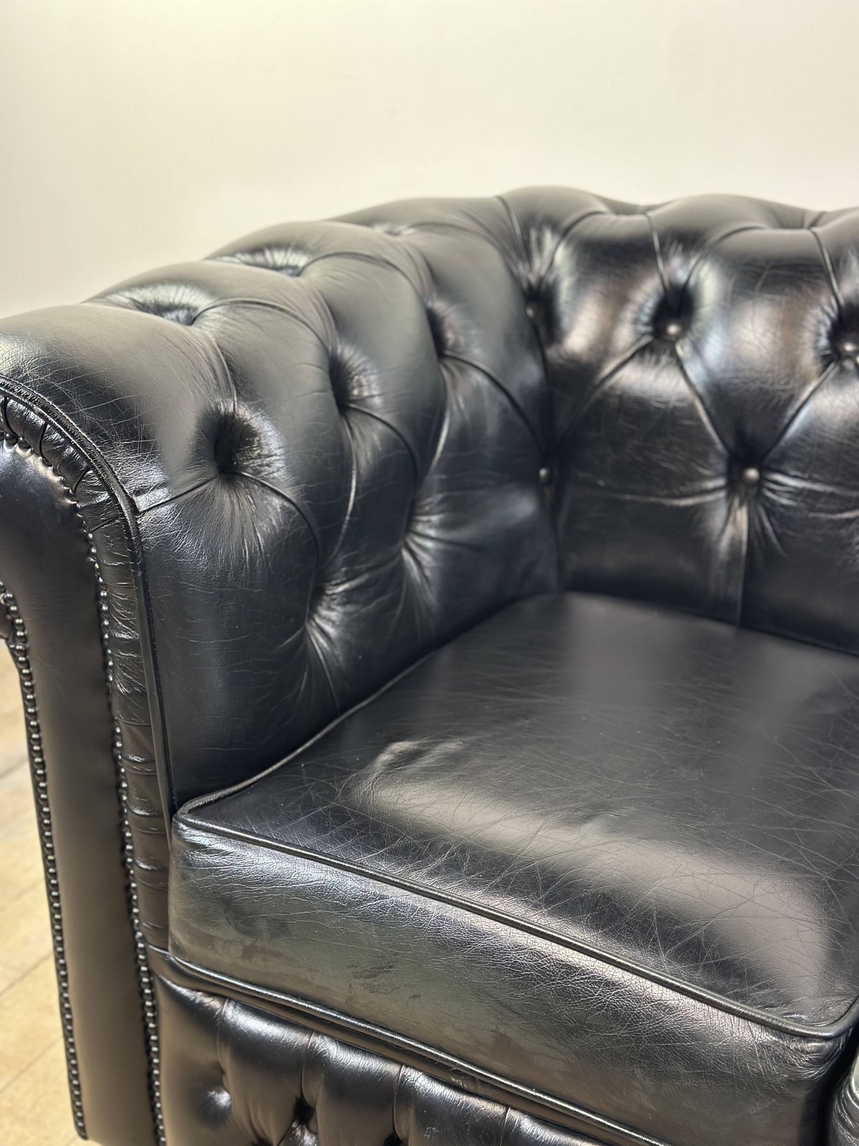 Vintage 1980 black leather Chesterfield sofa