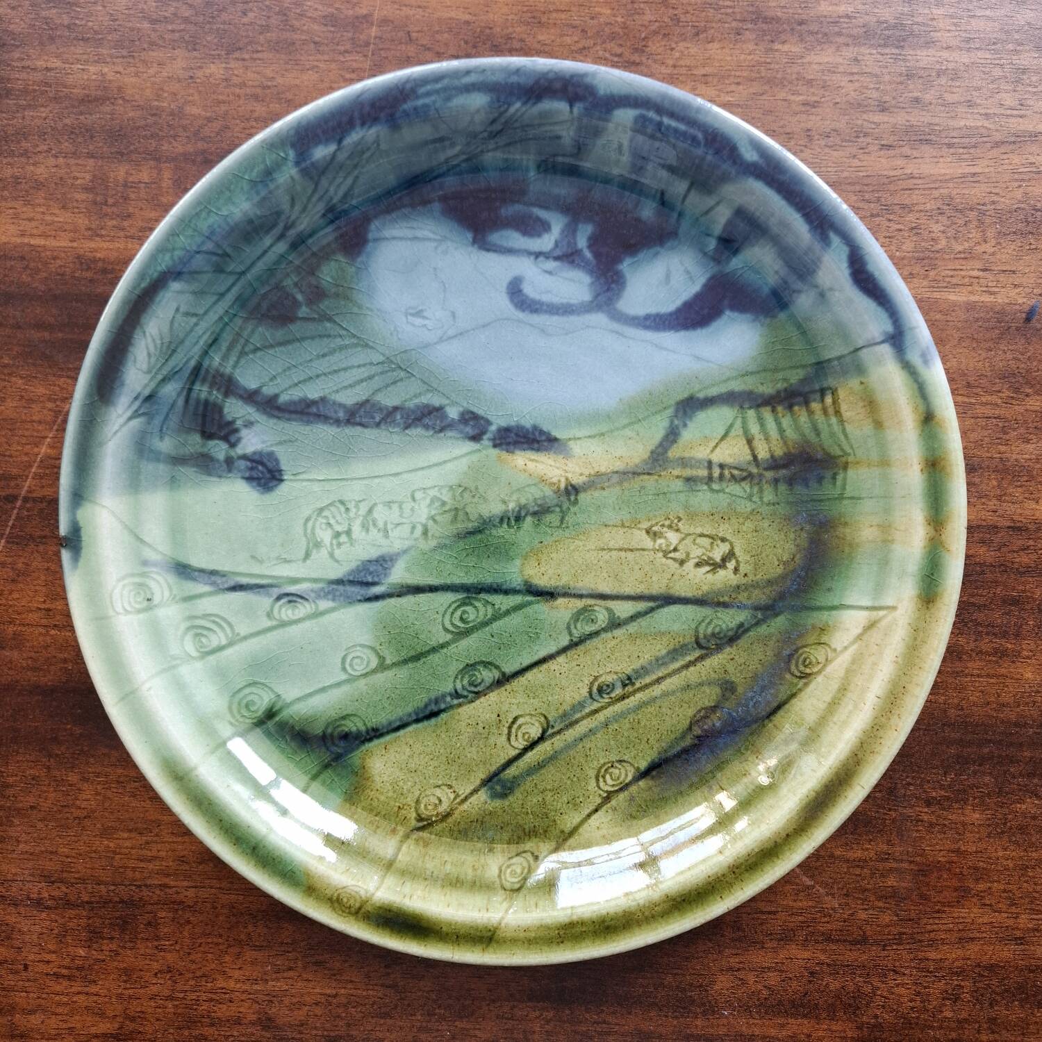 Decorative enamelled ceramic plate, 20th century