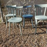 Set of 4 mismatched blue chairs