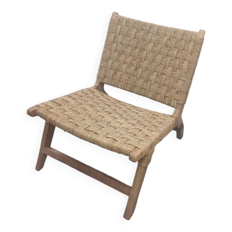 Chair woven from palm leaves