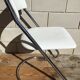 White faux leather sled chair