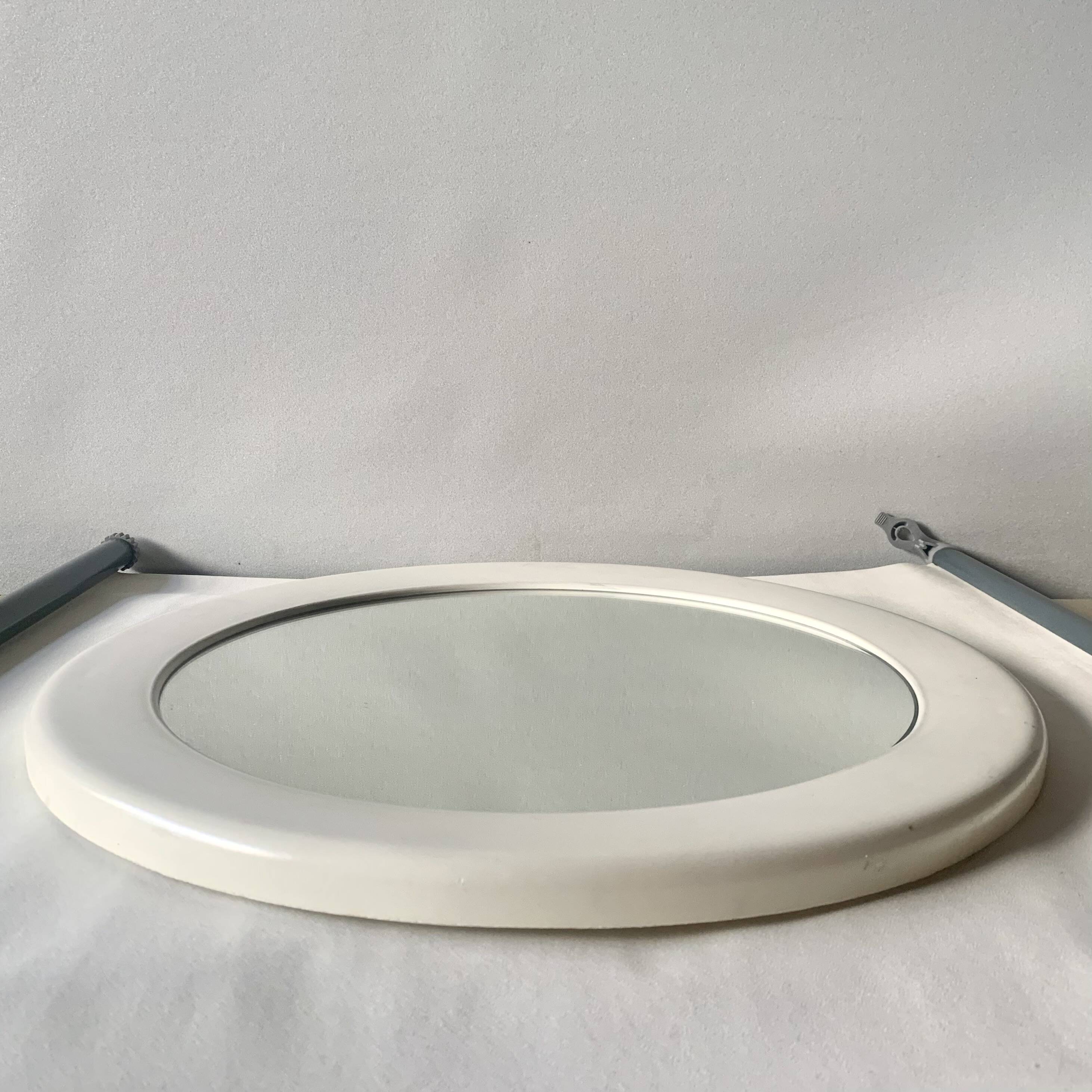 Vintage round white plastic mirror