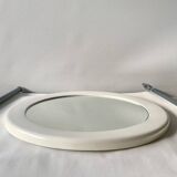 Vintage round white plastic mirror