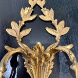 Pair of double sconces in gilded bronze